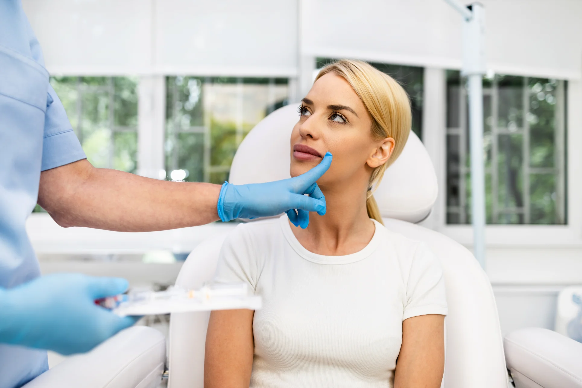 Provider discussing difference between dermal fillers and neuromodulators at Gold Skin Care Nashville