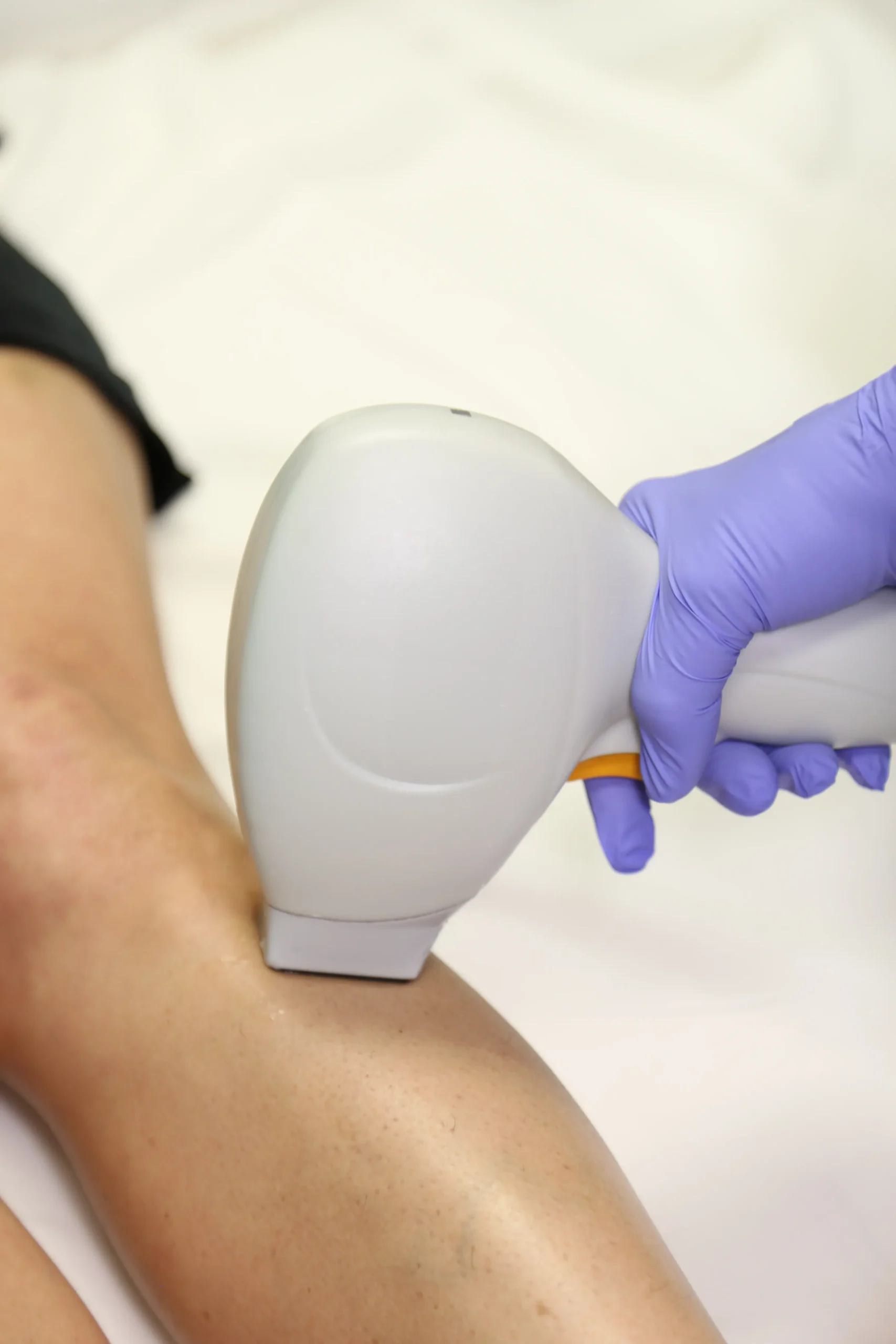 Woman examining skin concerns considering chemical peel treatment at Gold Skin Care Center Nashville